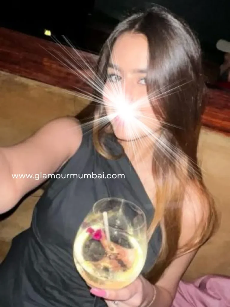 Aarohi verified escort in Mumbai enjoying a luxury club night in a fashionable black dress