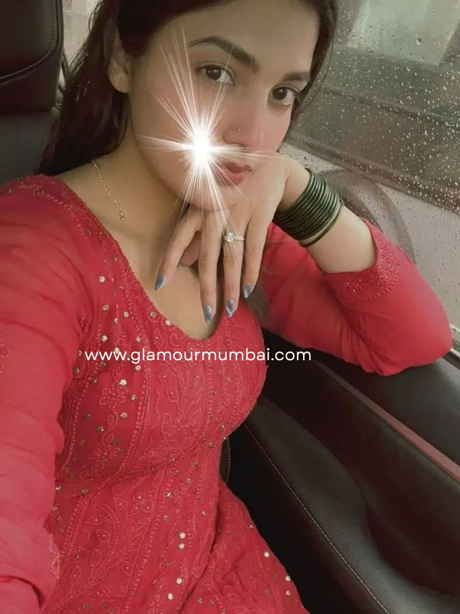 Stylish Mumbai escort Ankita resting hand near face