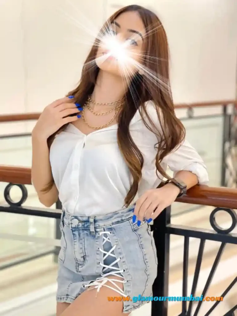 Kiara smiling in an elegant outfit, featured by a trusted escort service in Mumbai